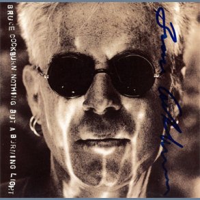 Nothing But A Burning Light - Autographed