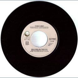 Walking On Thin Ice b/w. It Happened 