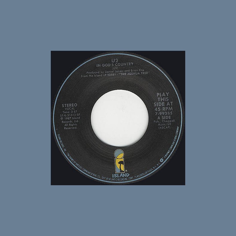 In God's Country b/w Bullet The Blue Sky &amp; Running To Stand Still