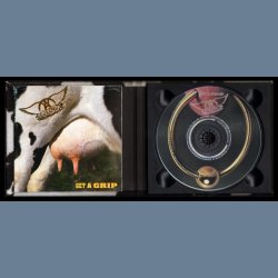 Get A Grip - US Limited Edition 15-track CD Album