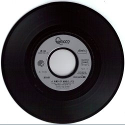 A Kind Of Magic b/w A Dozen Red Roses For My Darling - Original French issue