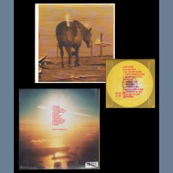 Reveal - Original 2001 US Warner Bros label limited edition 12-track CD