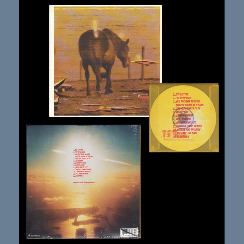 Reveal - Original 2001 US Warner Bros label limited edition 12-track CD