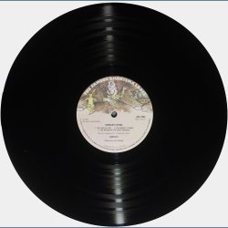 Nursery Cryme - 1974 UK Charisma label 7-track LP - Small Madhatter logo &amp; B&C text labels