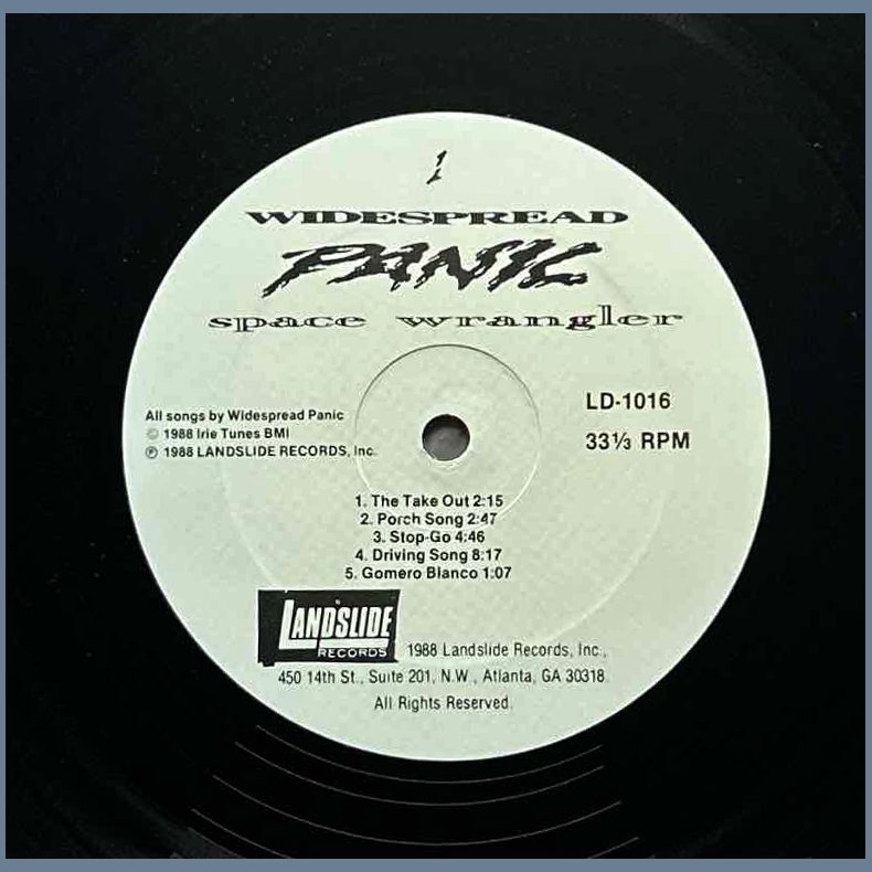 Space Wrangler - Original 1988 US Landslide label 9-track LP